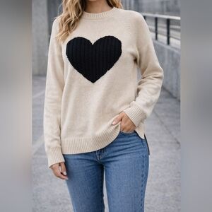 Cozy Cream Sweater with Black Heart Design